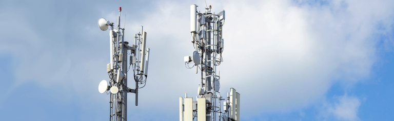 Mobile towers with blue sky. Network coverage concept