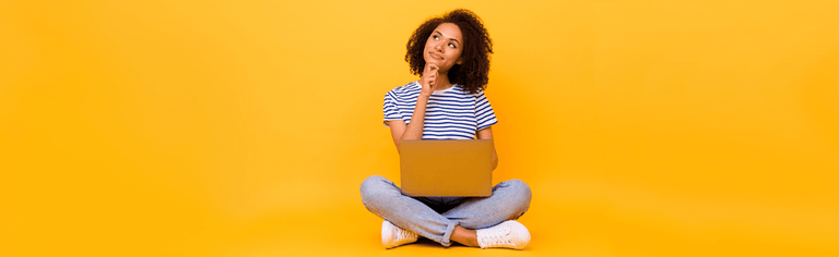 Woman using laptop with yellow background, Internet contention ratio concept.