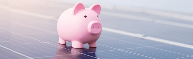 Solar panel rebates in Australia. Piggy bank on solar panels.