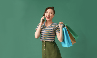 Woman shopping and using smartphone