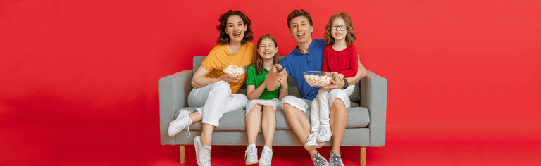 Happy family watching TV